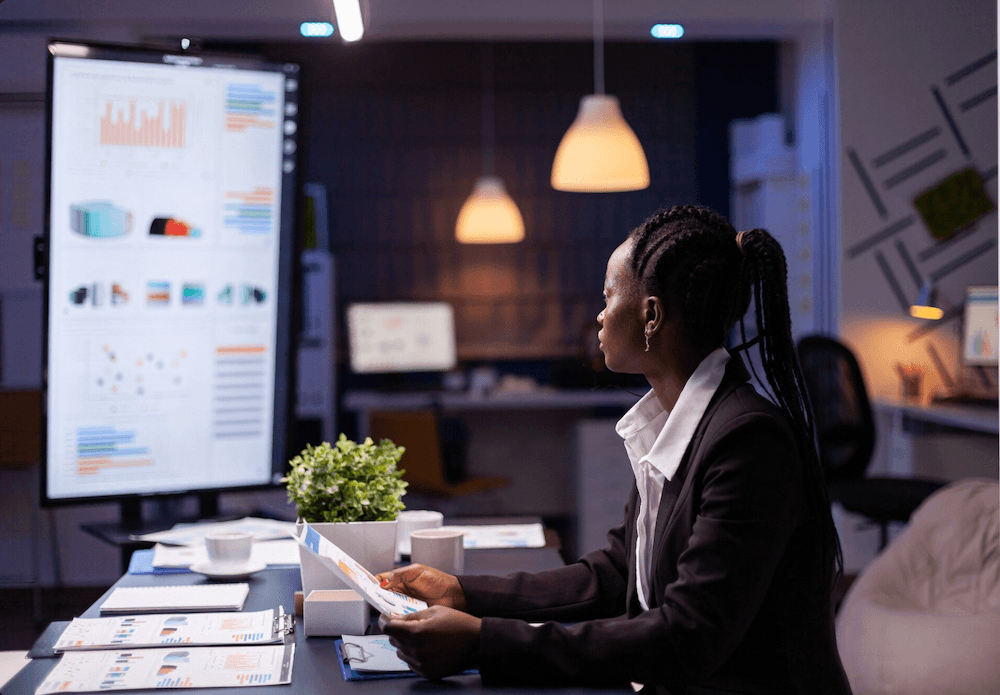 Professional reviewing analytics in an office